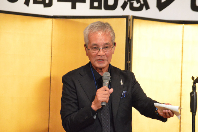 満面の笑顔で締めの挨拶を行った、建交労関西支部顧問の岡元貞道氏。